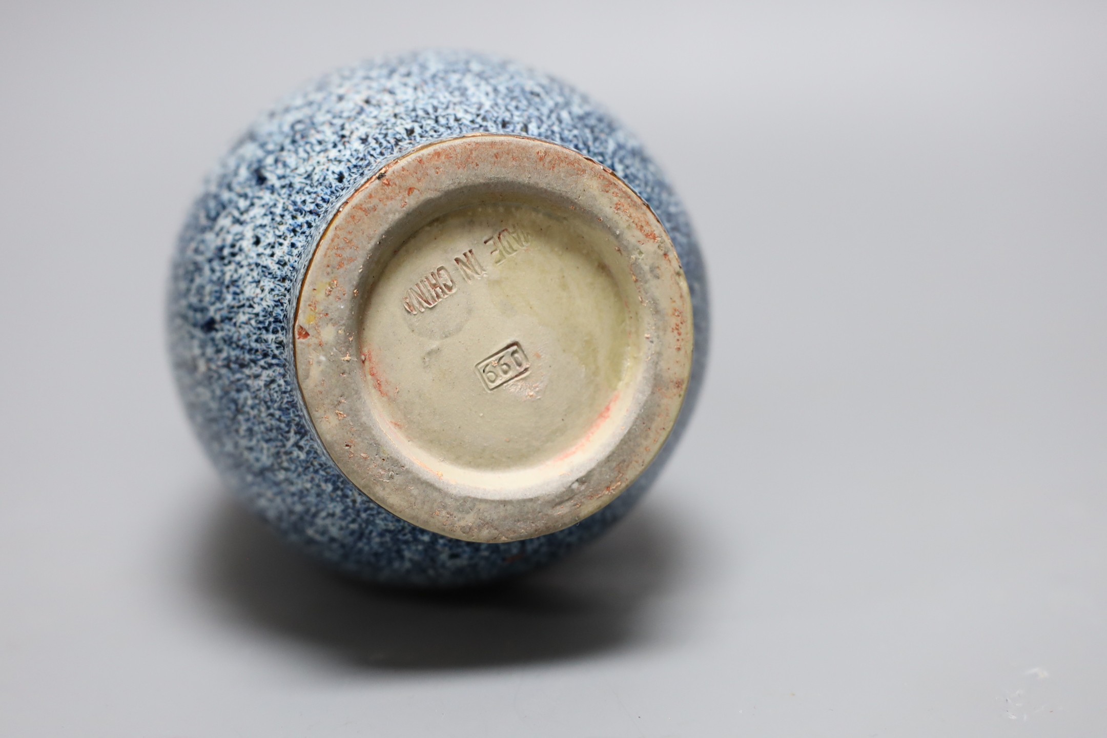 A Chinese Shiwan vase, 23 cms high